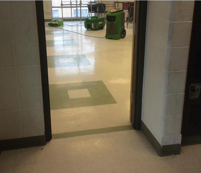 equipment--green-drying out the classroom, no visible water on the floor