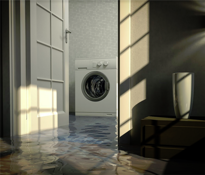 flooded laundry room in an home