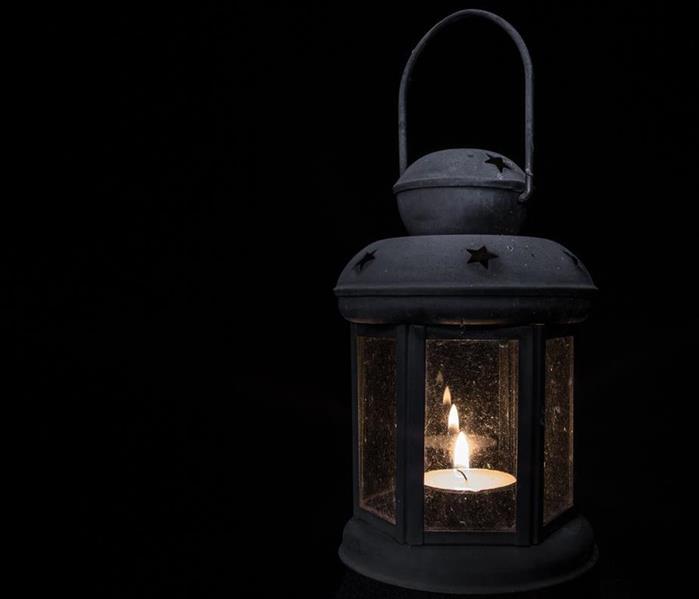a beautiful lantern lit in the dark